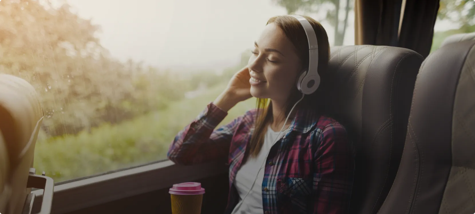 Girl in headphones enjoying the trip